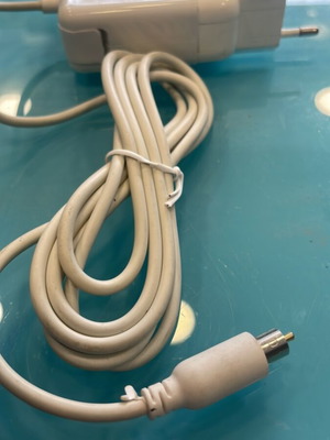 MacBook power adapter from previous decade, new