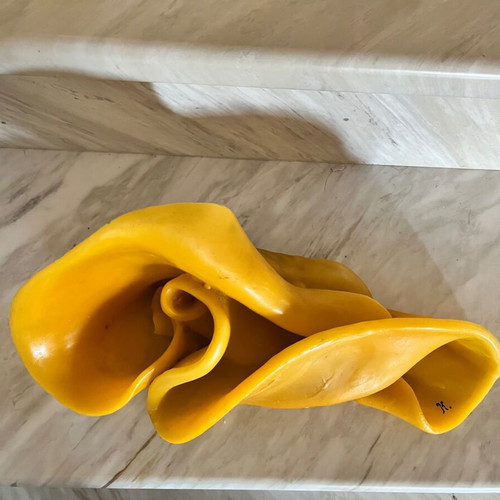 Handmade decorative candle with irregular shape, like new, yellow