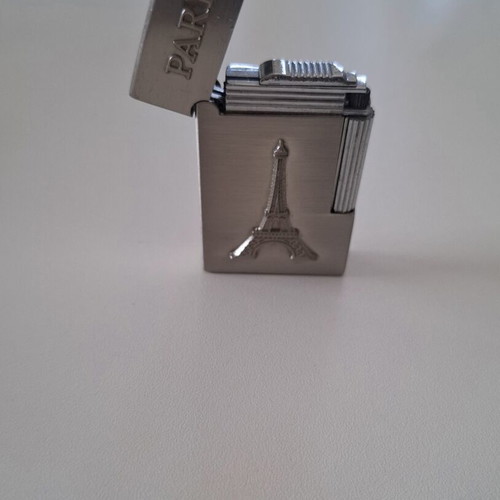 Gas lighter with Eiffel Tower design, like new