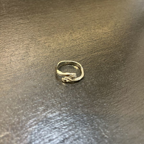 Steel ring silver color adjustable size with hands design like new