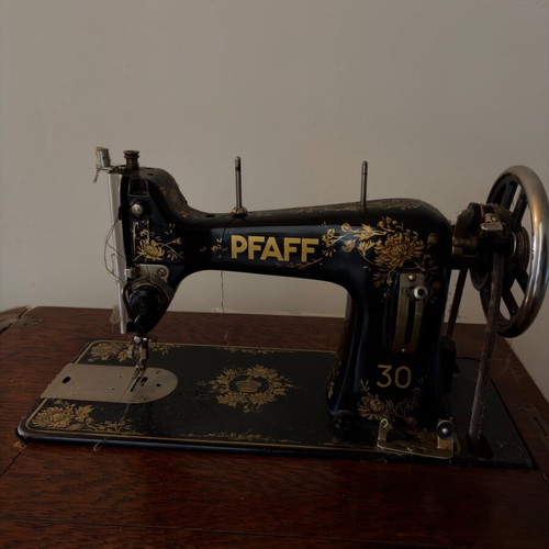 Pfaff sewing machine with cabinet like new, collectible