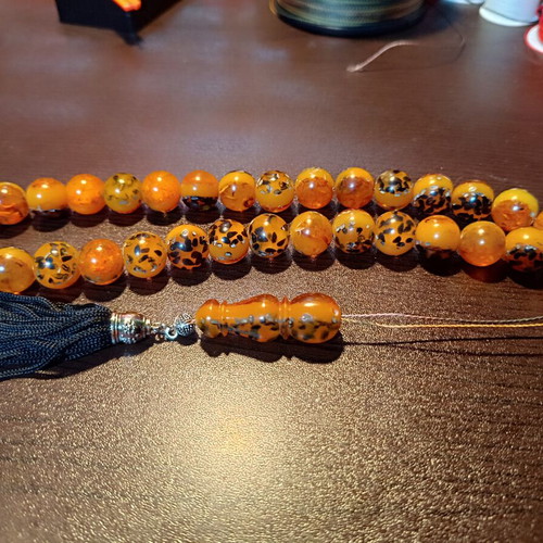 Komboloi worry beads with 33 saffron-colored beads and silk tassel