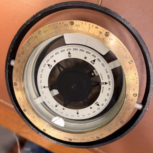 Nautical items like new: bell, gyroscopic compass, illuminated compass