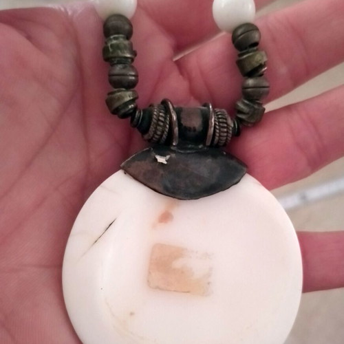 Handmade necklace with white pearls and bone charm used