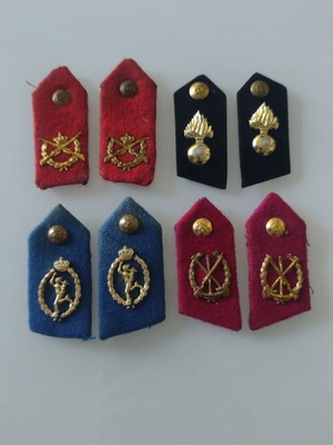 Collection of used infantry, artillery, signal, and engineer military badges from monarchy period