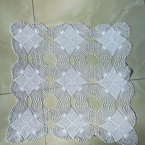 Handmade crocheted doily used with cotton thread