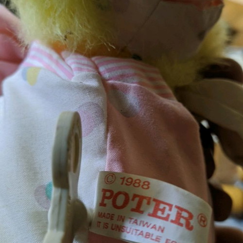 Poter doll used, plays music normally