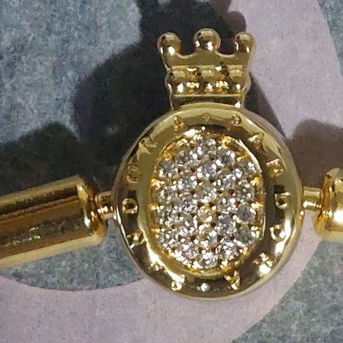 Pandora bracelet size 20 cm, gold plated with crown clasp