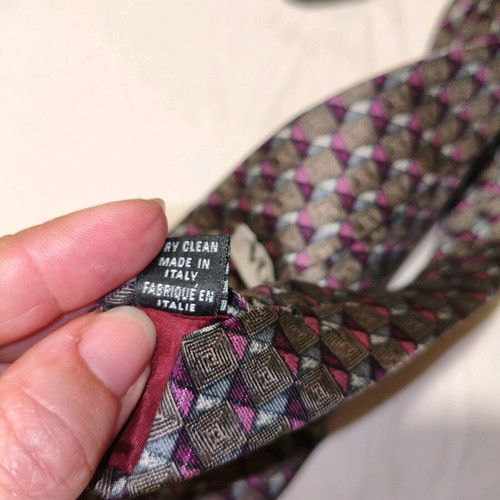 Vogue silk tie used with geometric pattern in brown and purple