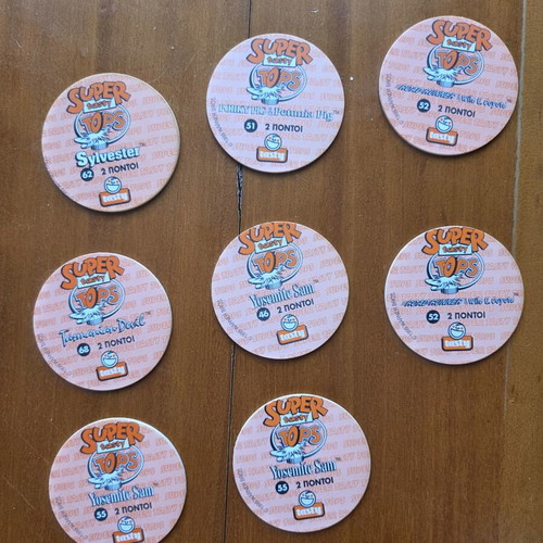Looney Tunes Super Tasty Tops set of 8 used 1995