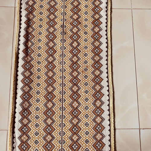 Handmade embroidered table runner used
