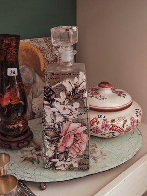 Decorative glass bottle with flowers like new