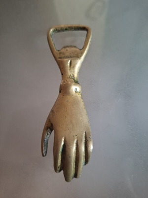 Brass hand bottle opener 1950s