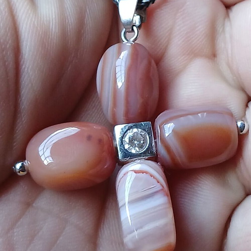 Silver necklace cross with carnelian stones used
