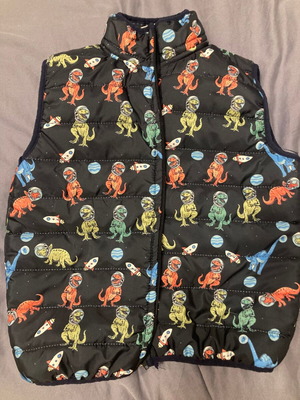 Puffer sleeveless jacket Funky like new, dark blue with dinosaur and rocket prints, size 110 cm