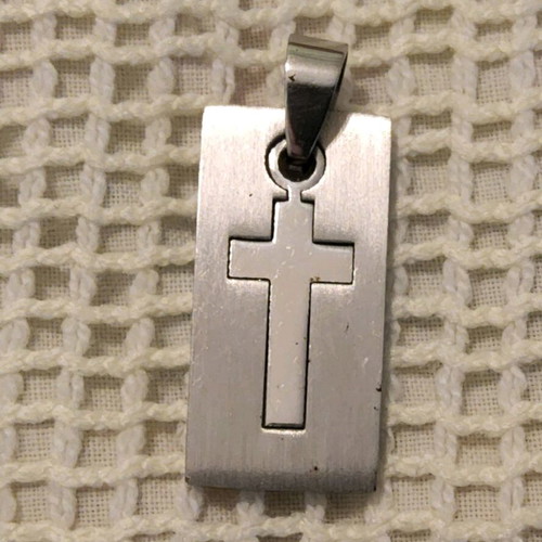Pendant with steel cross like new, silver color