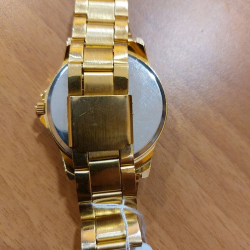 Wristwatch with gold bracelet new, diameter 38mm