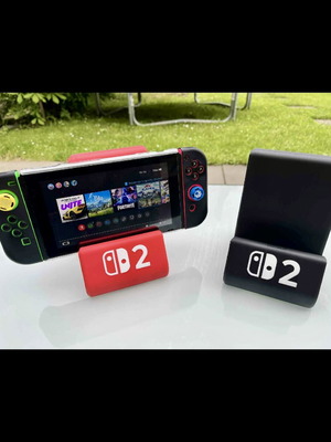 Nintendo Switch 2 stand new in black or red