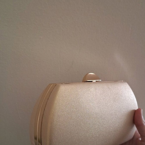 Gold bag like new, can be held as clutch or with strap
