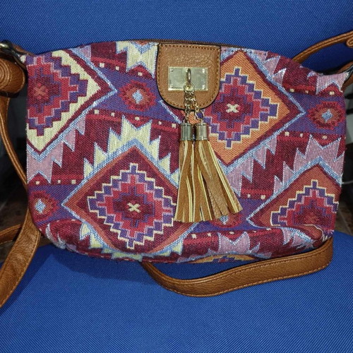 Crossbody bag used multicolor fabric and leatherette