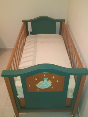 Wooden baby cot like new with mattress and adjustable rails