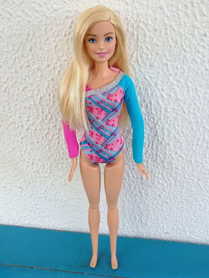 Barbie doll with one-piece swimsuit like new by Mattel