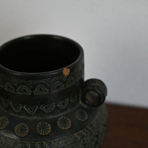 Decorative ceramic vase in ancient style with geometric motifs