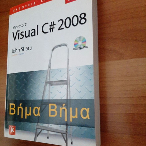 Microsoft Visual C# 2008 book by John Sharp like new with CD