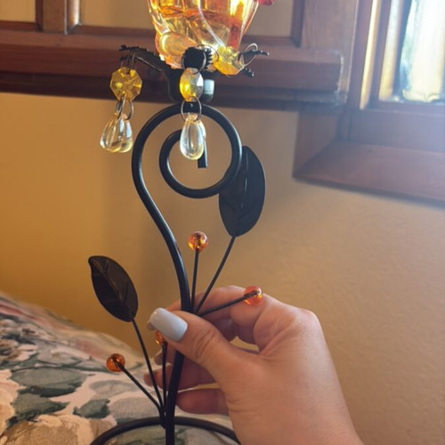 Vintage candlestick with amber glass holder and metal details like new