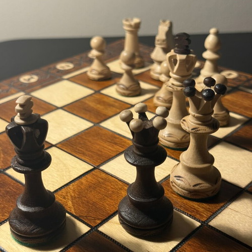 Handmade wooden chess set like new with folding board