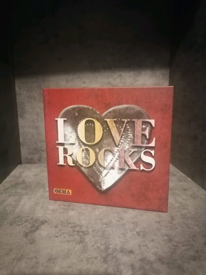 Love Rocks CD like new, rock genre