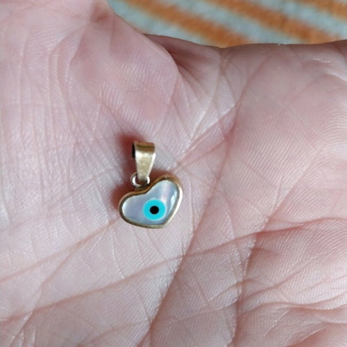 Silver heart 925 with evil eye used, gold color