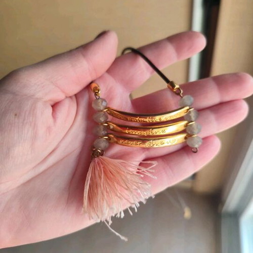 Long necklace with brown leather and motif like new