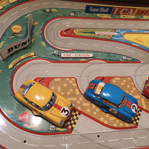 Race track toy with 3 wind-up cars used, 1960, metal