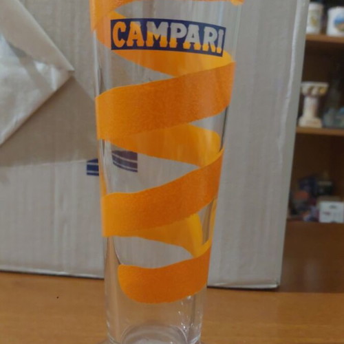 Campari glass like new with orange spiral designs