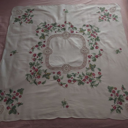 Handmade counted embroidery with handmade lace used