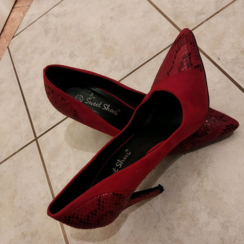 Red leather pumps used, size 39