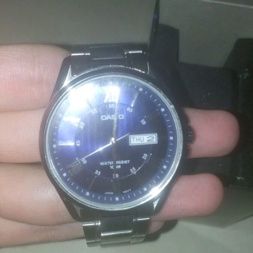Casio men's watch with blue dial and silver bracelet, new