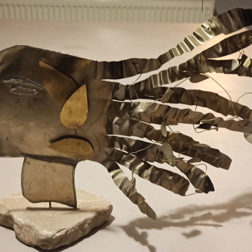 Decorative art piece like new, bronze and metal head sculpture