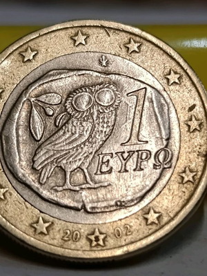 1 Euro coin used with sigma inside star and extra metal