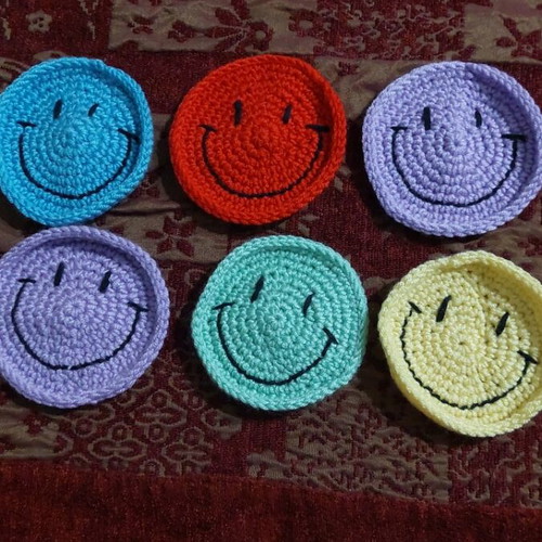 Knitted smiley coasters new, cup holders