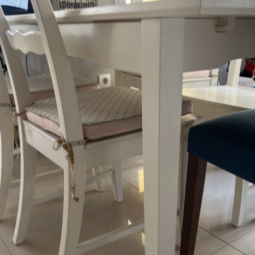 White dining set with 4 Boconcept chairs used with minor wear