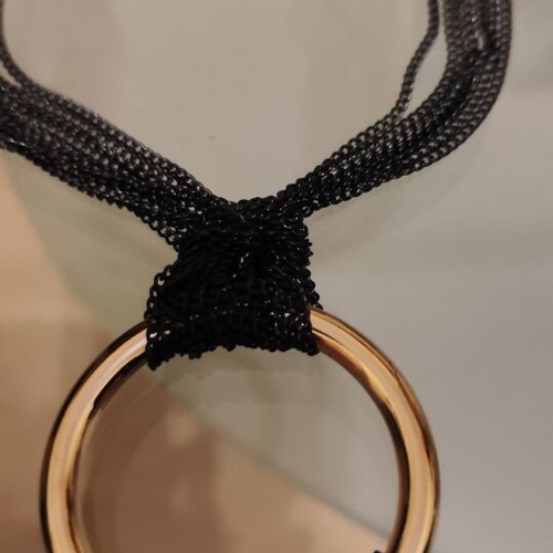 Long gold necklace with black chains new, heavy piece