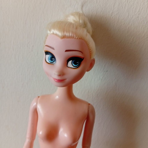 Elsa doll from Disney Frozen used, articulated arms