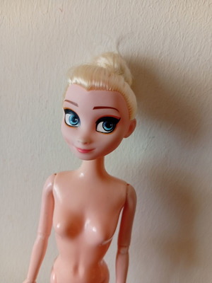 Elsa doll from Disney Frozen used, articulated arms