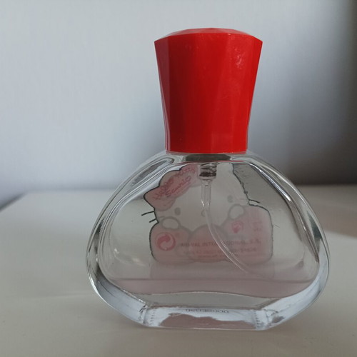 Empty Korres and Hello Kitty cologne bottles used for collection