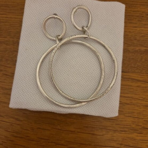 Earrings, bracelet and necklace used, silver color