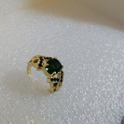 Ring with Oval Green Stone in Gold Color like new