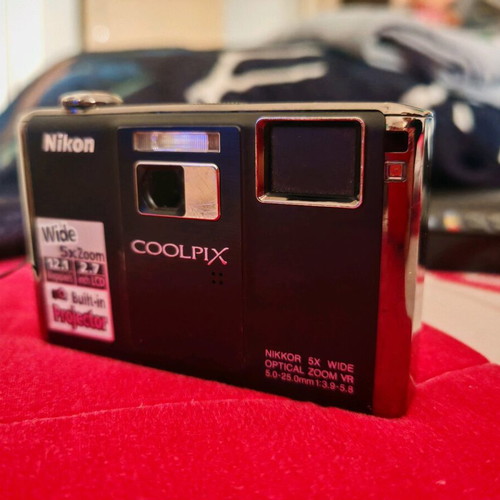 Nikon Coolpix S1000pj digital camera 12MP used with built-in projector