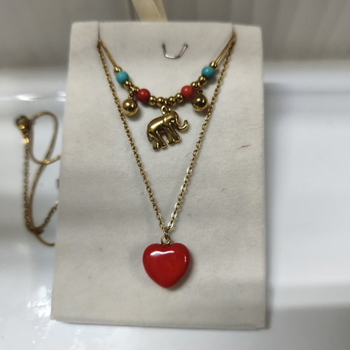 Two stainless steel necklaces like new, red and gold